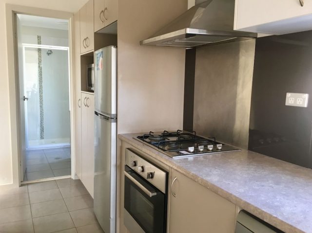 Cabin kitchen at Discovery Parks - Forster