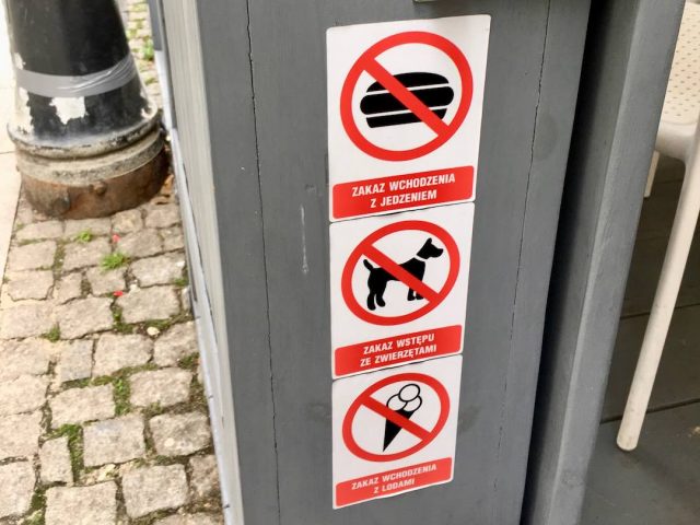 No dogs sign at outdoor dining area in Poland