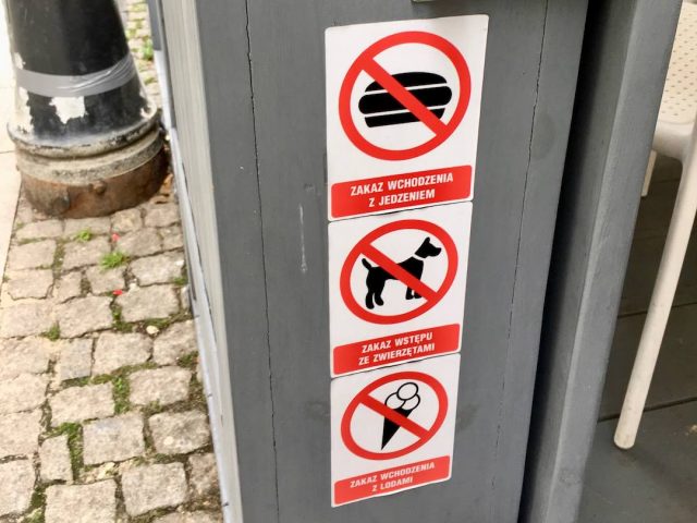 No dogs sign at outdoor dining area in Poland