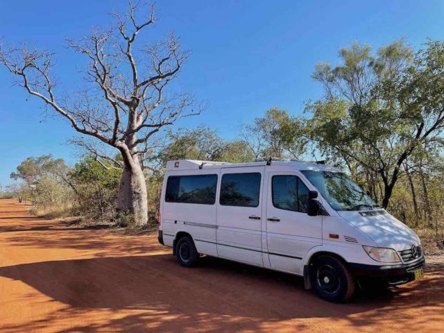 Campervan in Australia next to boab tree