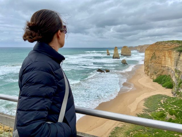 Woman looking at the 12 Apostles