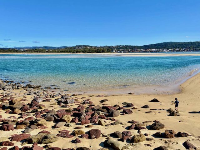 The calm, shallow waters of Bar Beach in Merimbula