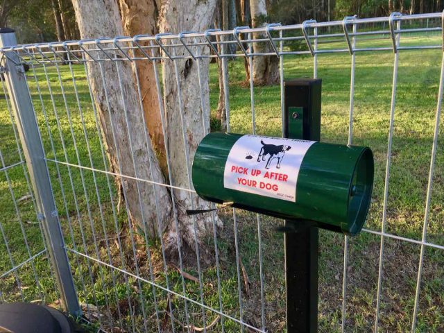 Dog poop bag dispenser