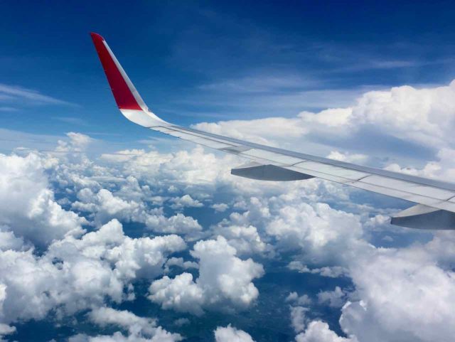 Plane Above Clouds Asia