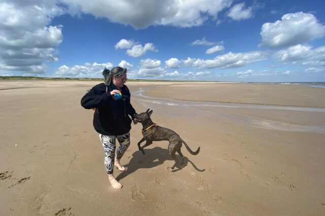 Huttoft Moggs Eye Beach Regan playing with ball